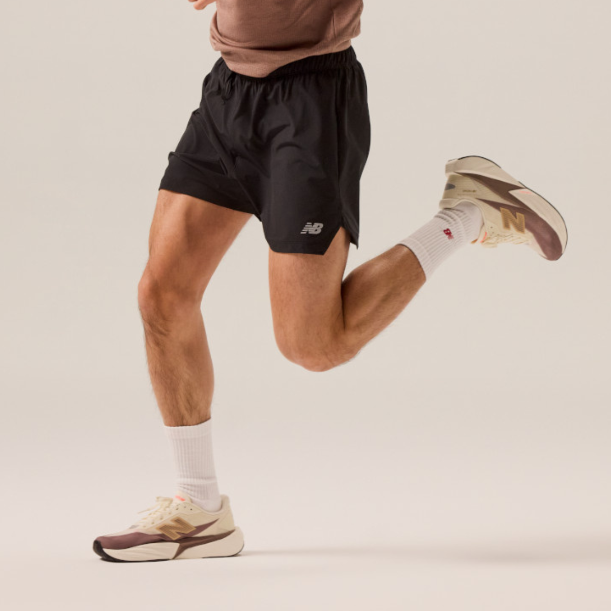 New Balance Men's FuelCell Rebel v5 in Angora with Earth Shadow and Sea Salt