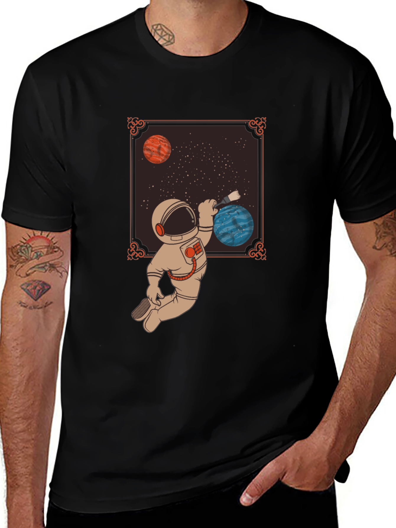 Astronaut Painting Planets Graphic Tee