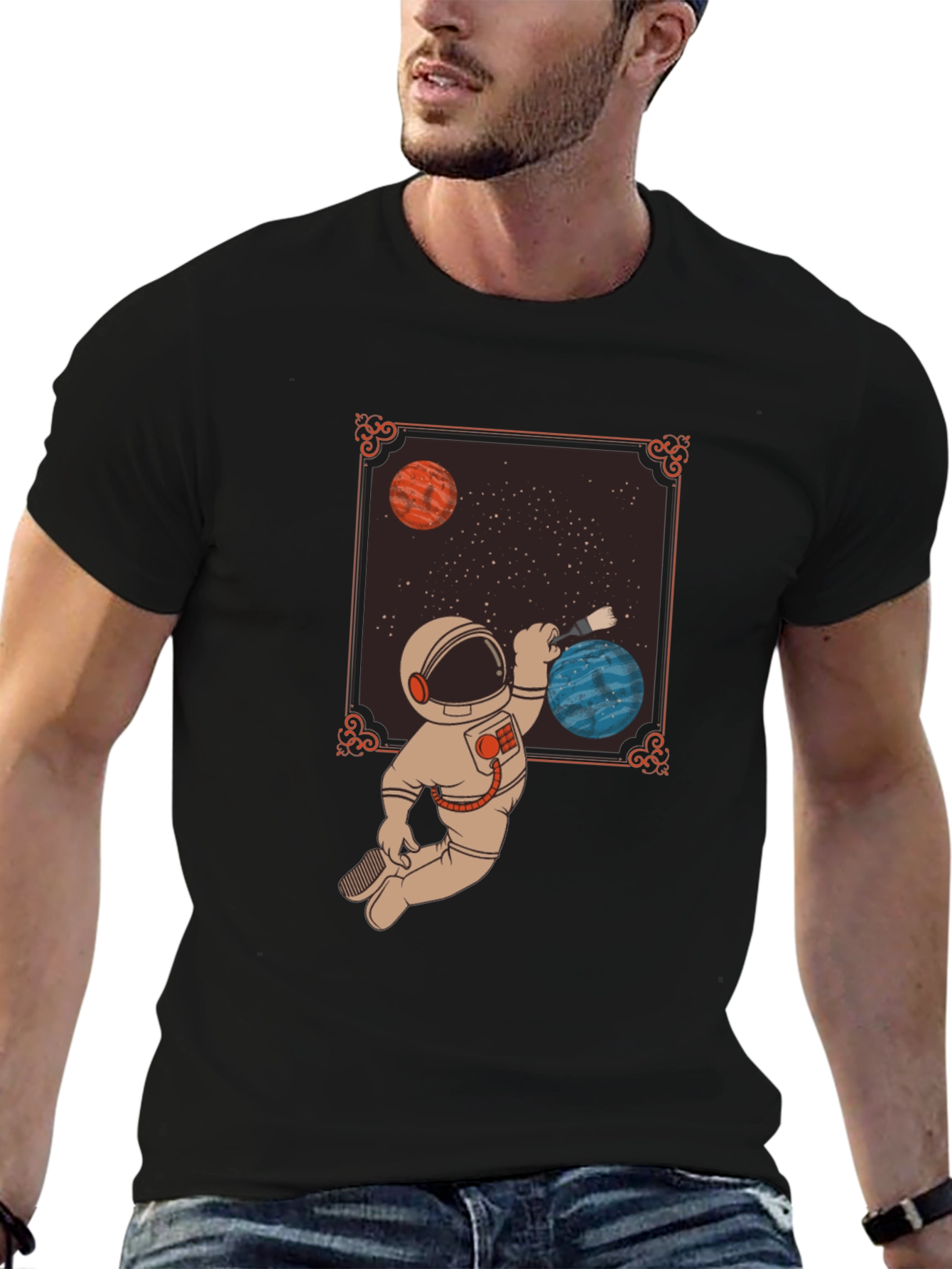 Astronaut Painting Planets Graphic Tee