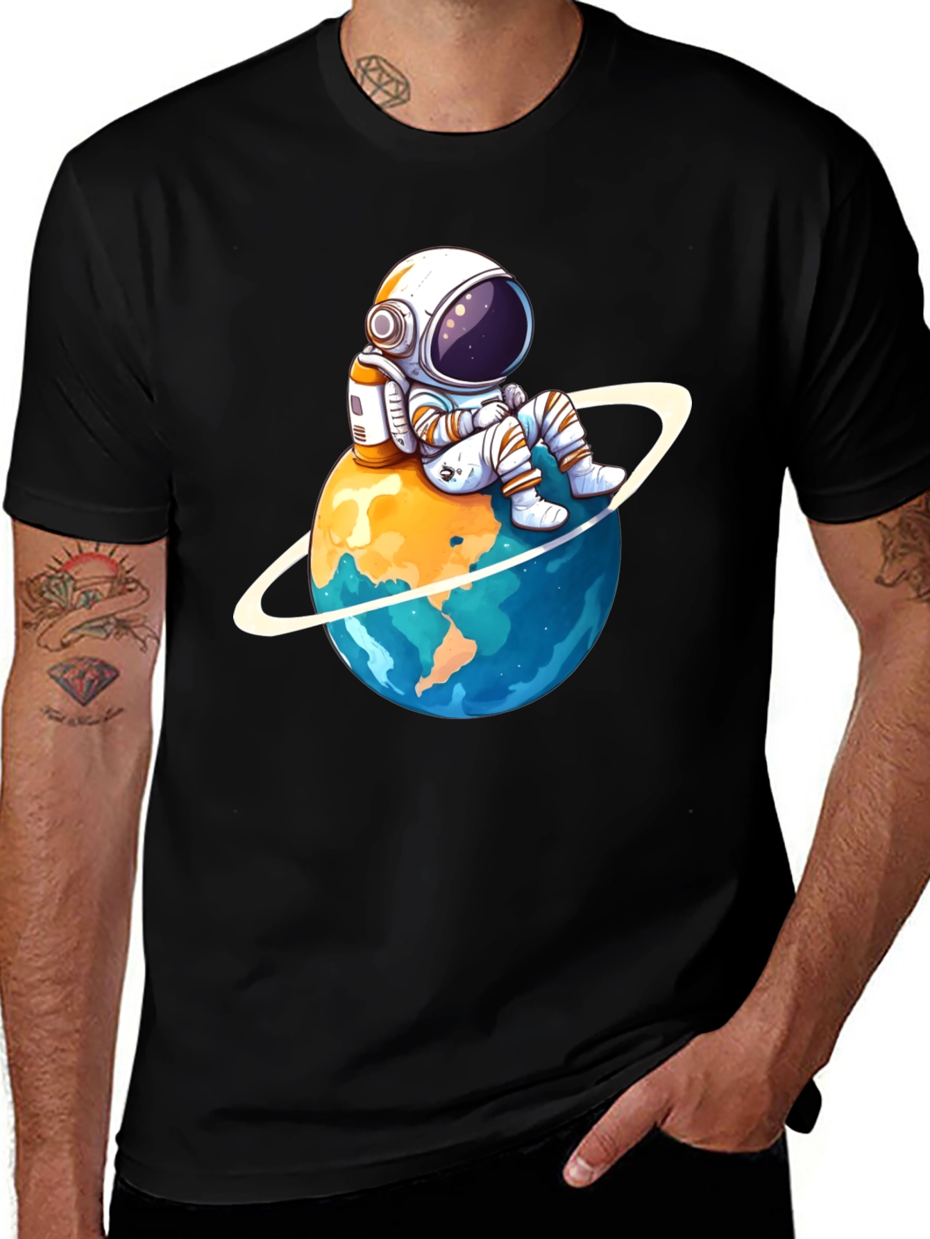 Astronaut on Planet T-Shirt - Black Cotton Graphic Tee